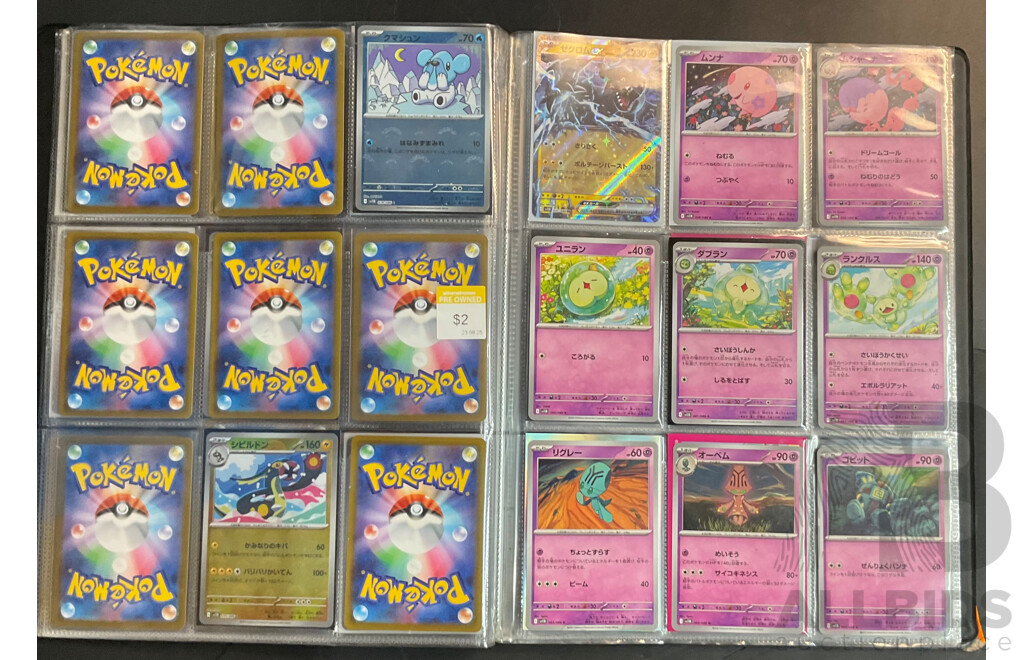Three Albums Containing More Than 500 Assorted Pokémon Trading Cards (JP)