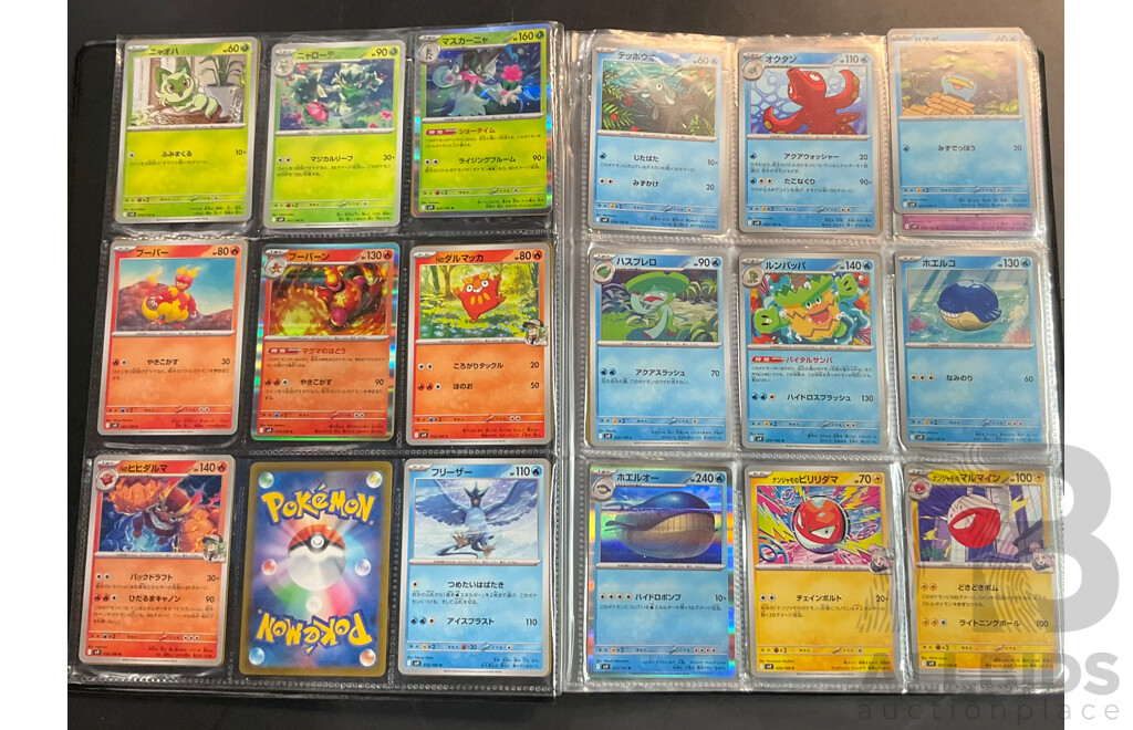 Three Albums Containing More Than 500 Assorted Pokémon Trading Cards (JP)