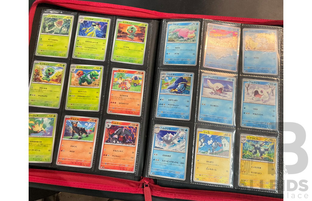 Three Albums Containing More Than 500 Assorted Pokémon Trading Cards (JP)