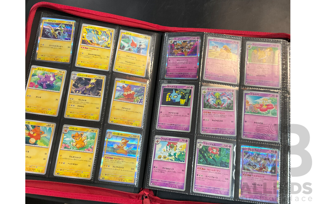 Three Albums Containing More Than 500 Assorted Pokémon Trading Cards (JP)