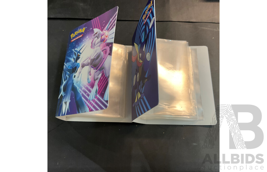 Assorted Collector's Album and Card Stoppers and Pokemon & Dragon Ball Redemption Cards