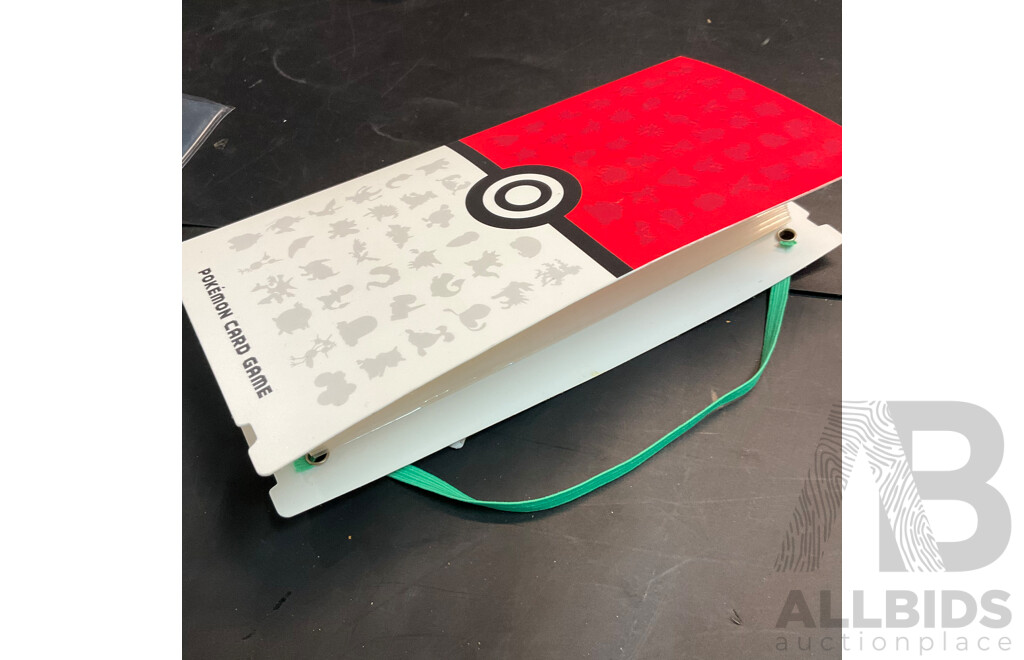 Assorted Collector's Album and Card Stoppers and Pokemon & Dragon Ball Redemption Cards