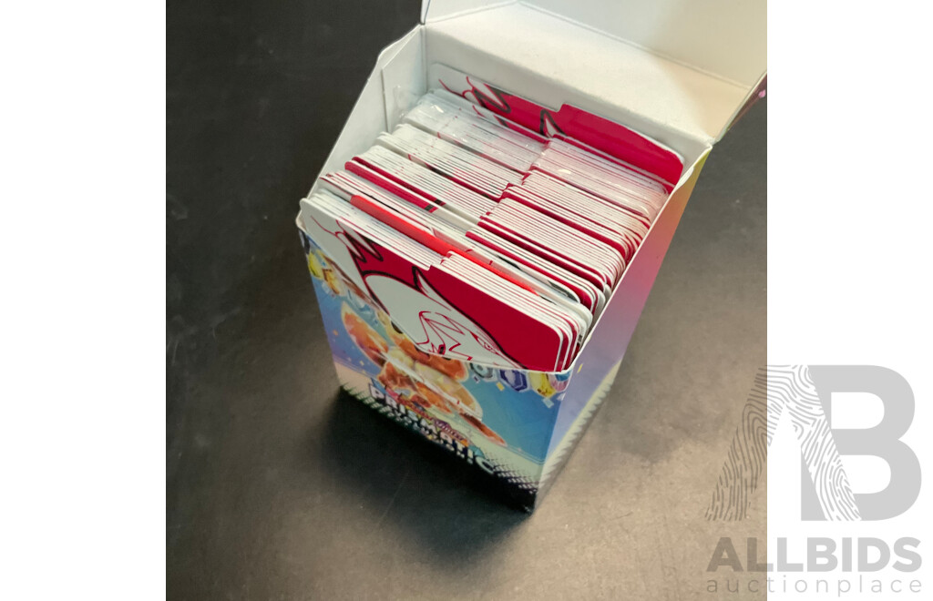 Assorted Collector's Album and Card Stoppers and Pokemon & Dragon Ball Redemption Cards