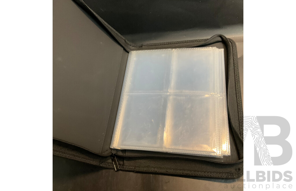 Assorted Collector's Album and Card Stoppers and Pokemon & Dragon Ball Redemption Cards