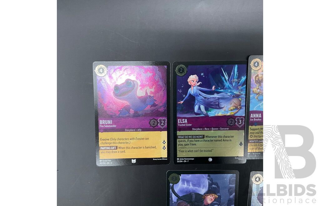 Assorted Lorcana's Frozen Character Cards Includes 7 Foil Cards - Lot of 12