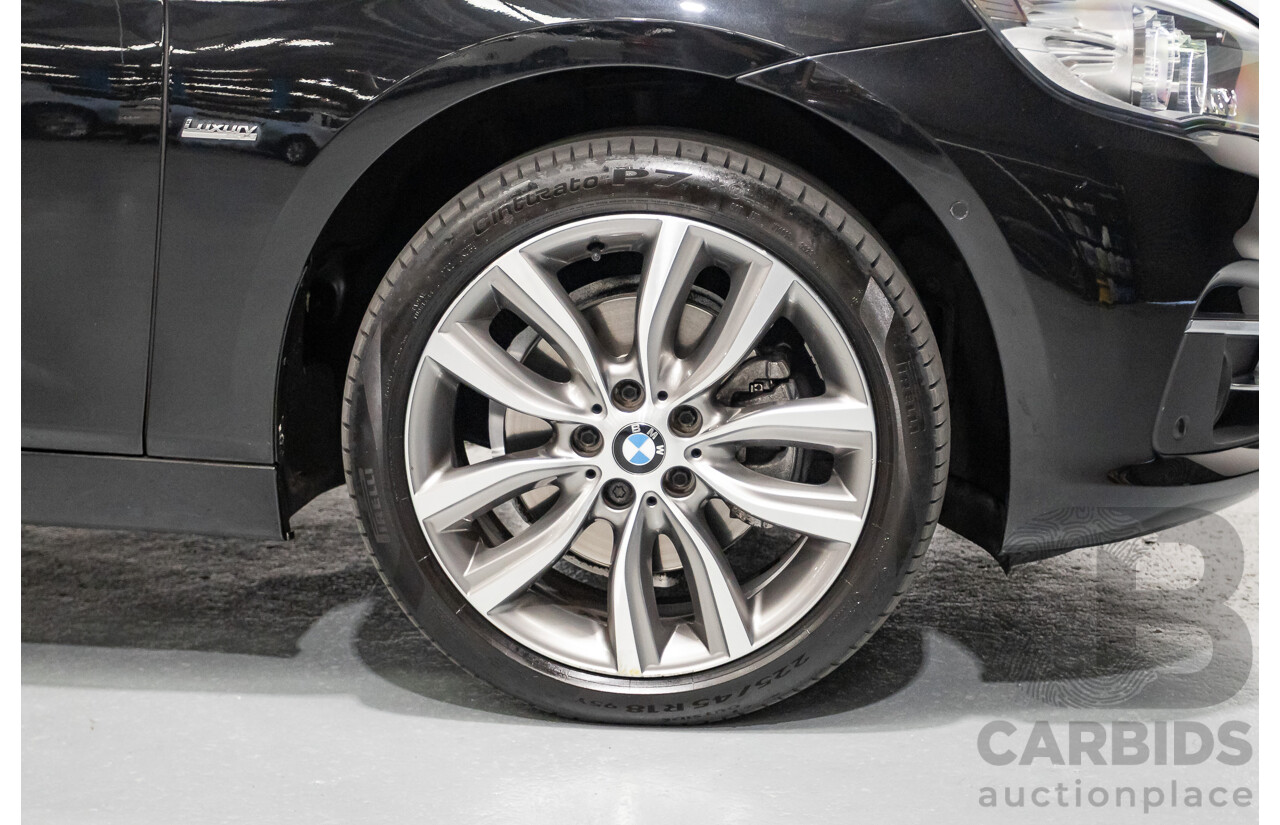 07/2017 BMW 220i Active Tourer Luxury Line F45 MY18 4D Wagon Black Sapphire Metallic Turbo 2.0L