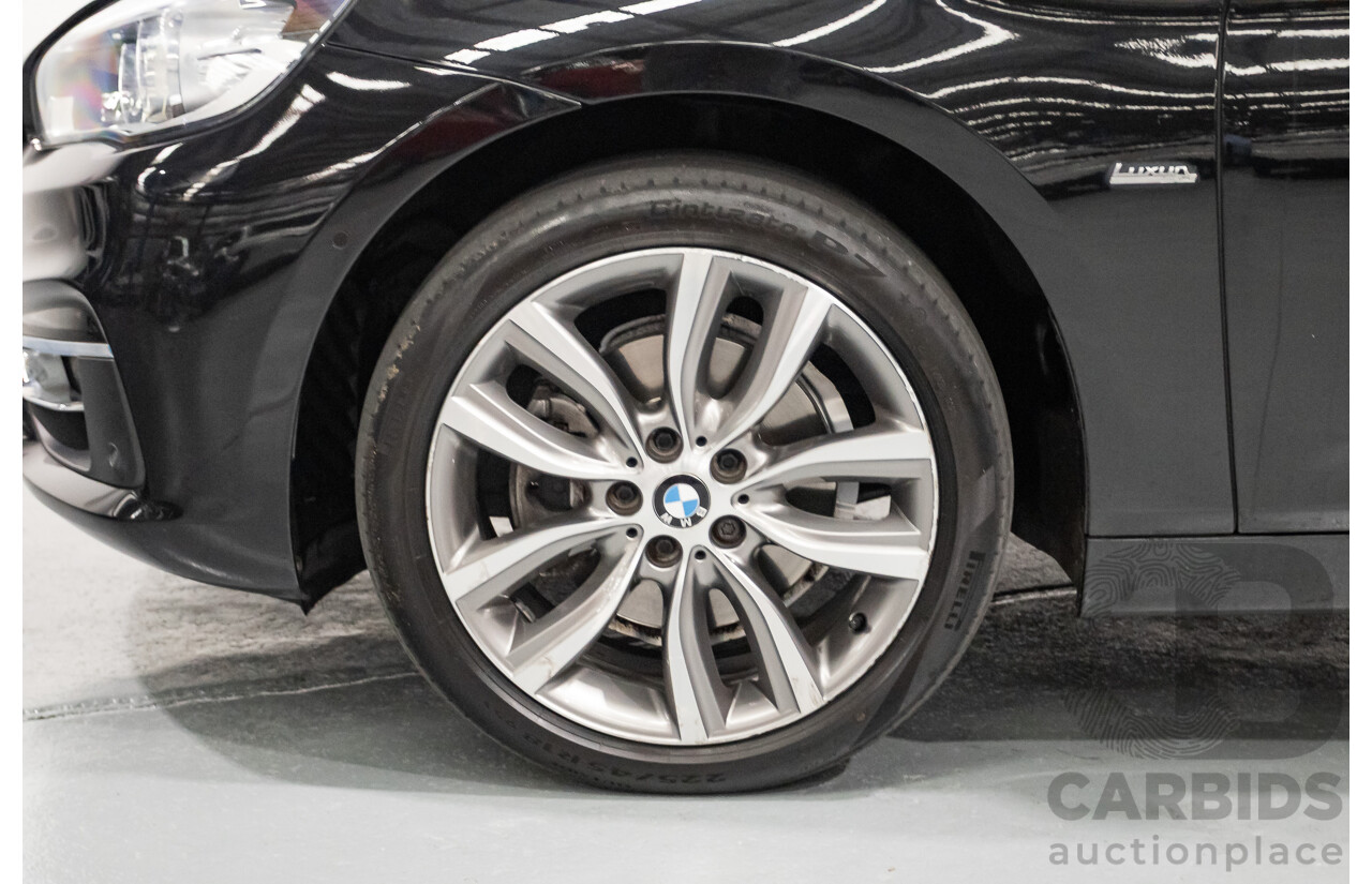 07/2017 BMW 220i Active Tourer Luxury Line F45 MY18 4D Wagon Black Sapphire Metallic Turbo 2.0L