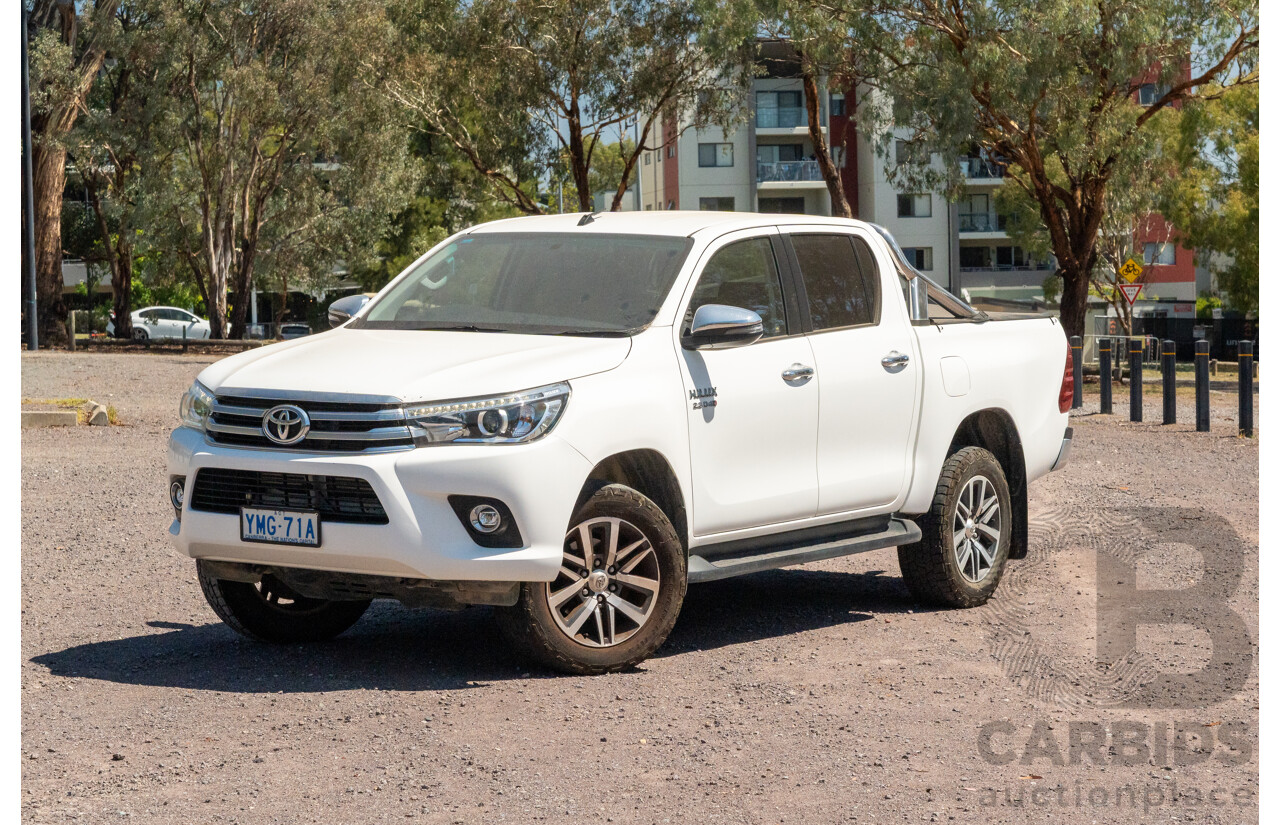 12/2017 Toyota Hilux SR5 (4x4) GUN126R Dual Cab Utility Glacier White Turbo Diesel 2.8L