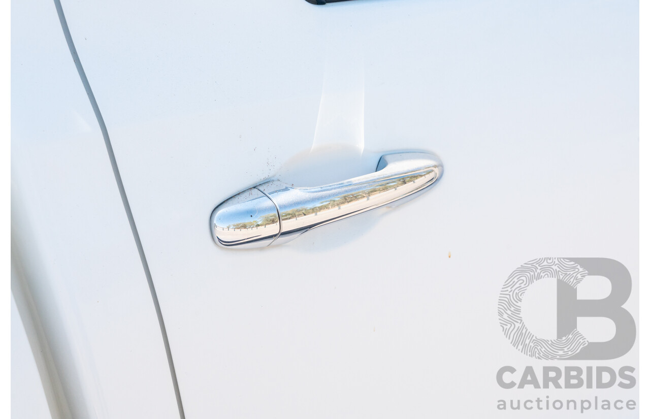 12/2017 Toyota Hilux SR5 (4x4) GUN126R Dual Cab Utility Glacier White Turbo Diesel 2.8L