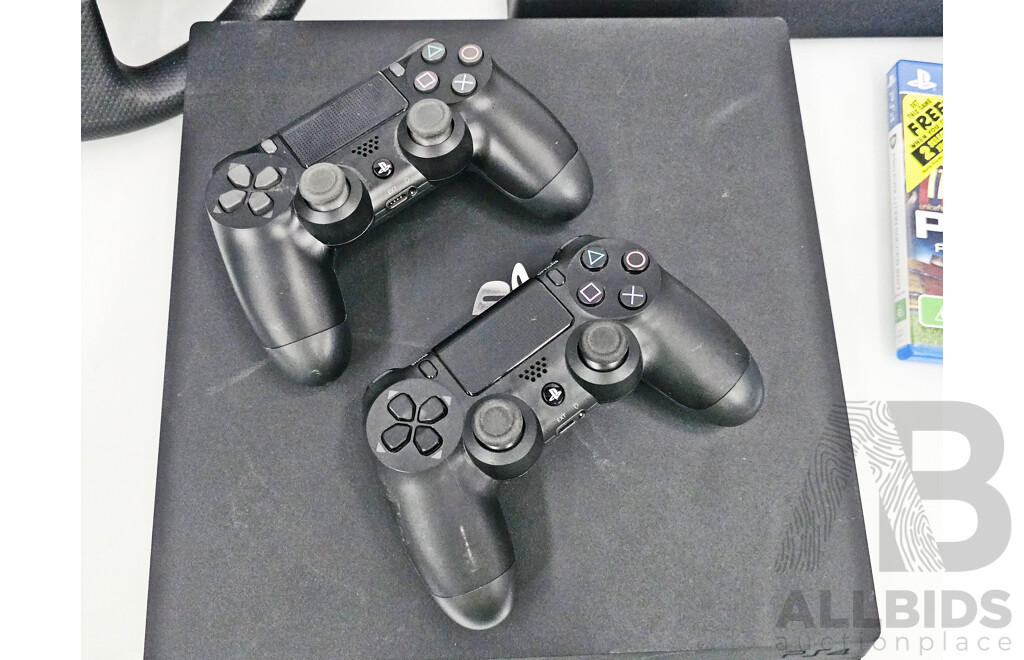 Sony Playstation 4 Pro Game Console W/ Racing Equipment, Controllers & Games