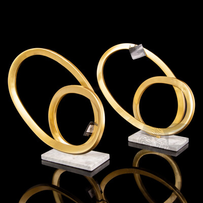 Pair of Amalfi Gilt Metal Rand Sculptures on Marble Bases