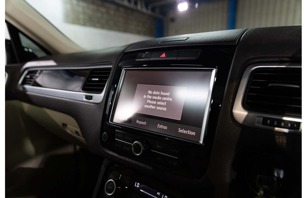 1/2012 Volkswagen Touareg V6 TDI 7P MY12 4d Wagon Deep Black Pearl Turbo Diesel V6 3.0L