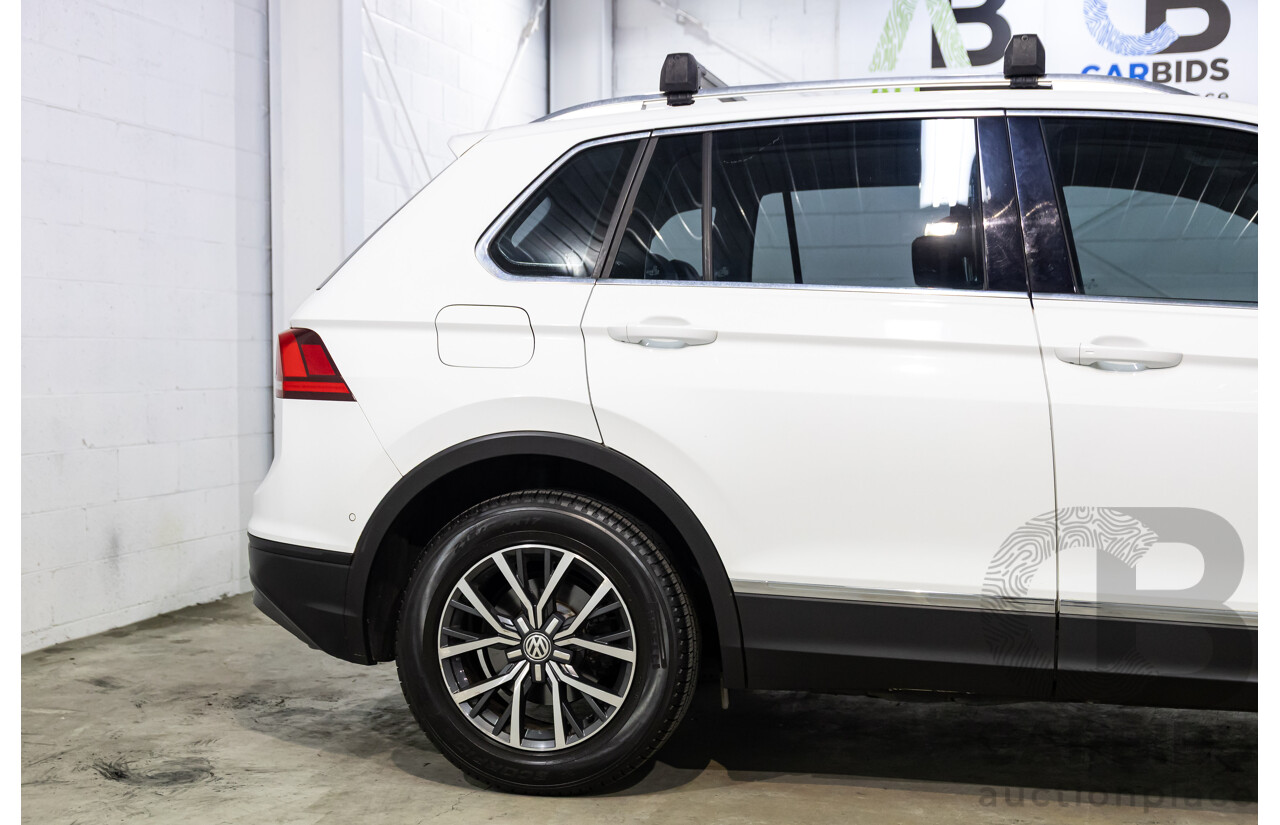 04/2017 Volkswagen Tiguan 132 TSI Comfortline (AWD) 5NA 4d Wagon Pure White Turbo 2.0L