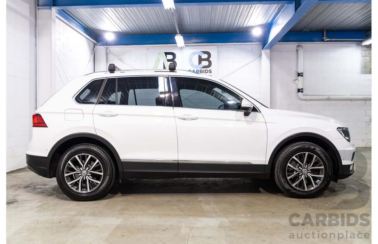 04/2017 Volkswagen Tiguan 132 TSI Comfortline (AWD) 5NA 4d Wagon Pure White Turbo 2.0L