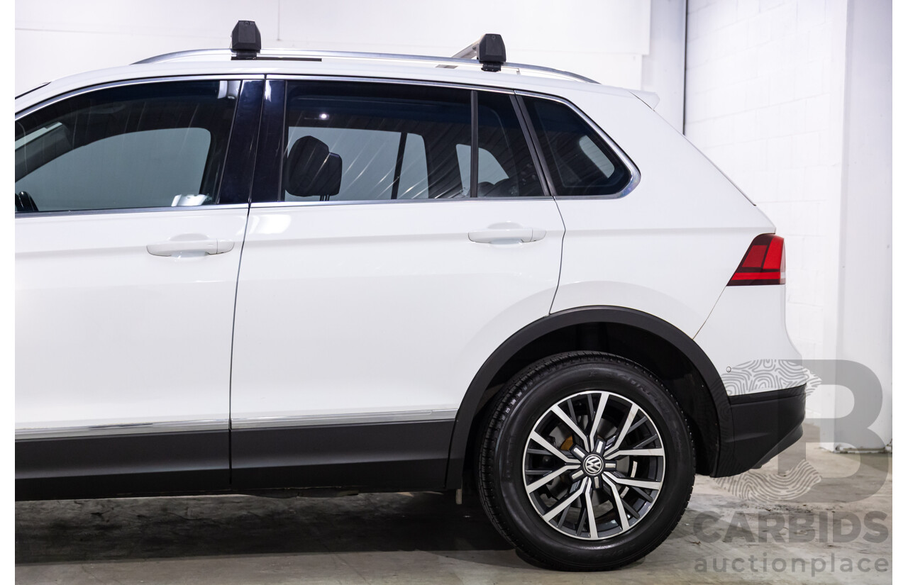 04/2017 Volkswagen Tiguan 132 TSI Comfortline (AWD) 5NA 4d Wagon Pure White Turbo 2.0L