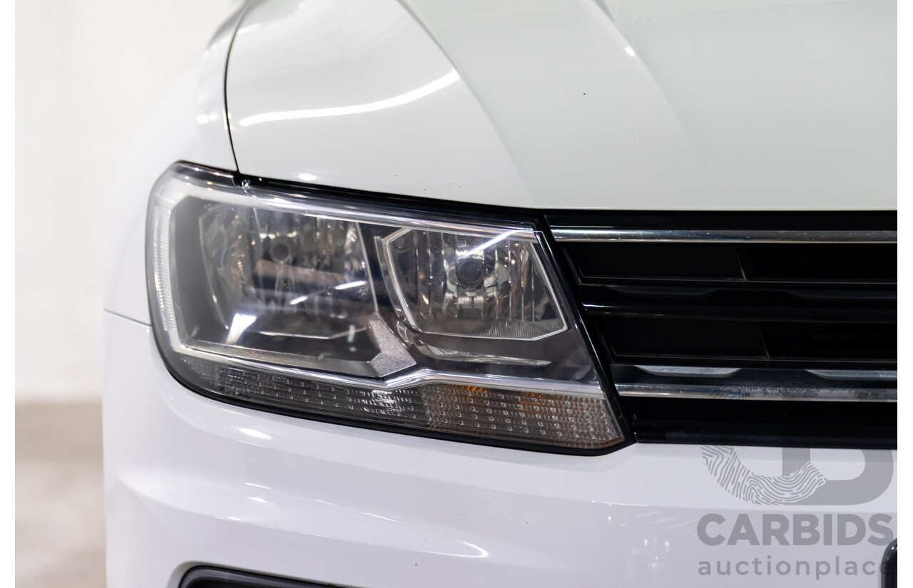 04/2017 Volkswagen Tiguan 132 TSI Comfortline (AWD) 5NA 4d Wagon Pure White Turbo 2.0L