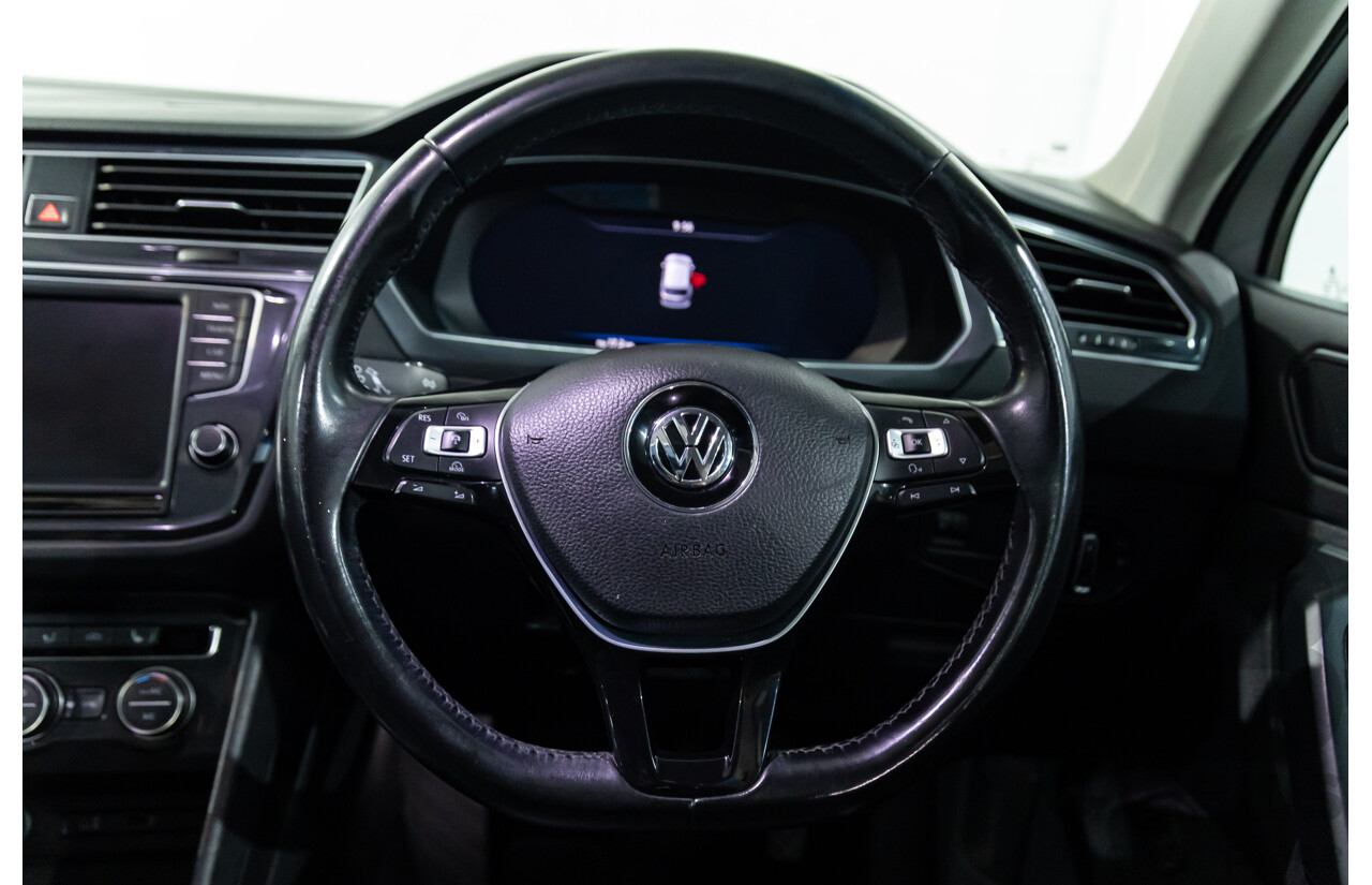 04/2017 Volkswagen Tiguan 132 TSI Comfortline (AWD) 5NA 4d Wagon Pure White Turbo 2.0L