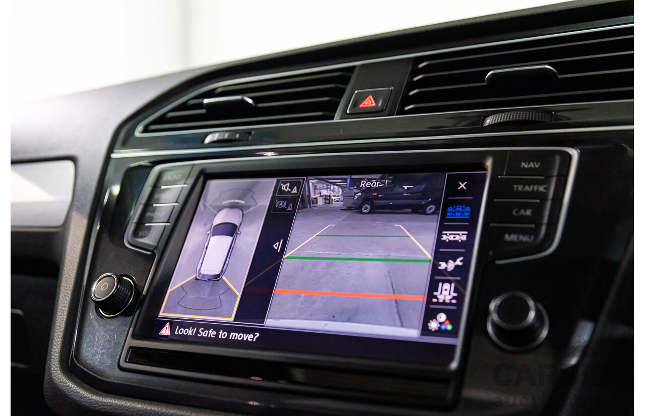 04/2017 Volkswagen Tiguan 132 TSI Comfortline (AWD) 5NA 4d Wagon Pure White Turbo 2.0L