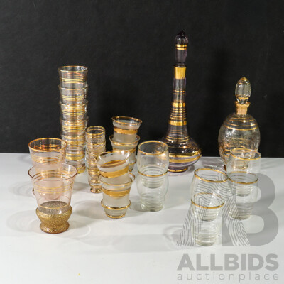 Collection of Glassware Including Decanter, Glasses and Shot Glasses with Gold Details