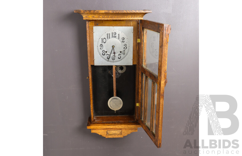 Oak Cased Sessions Wall Clock by W,M.L Gilbert Clock Co