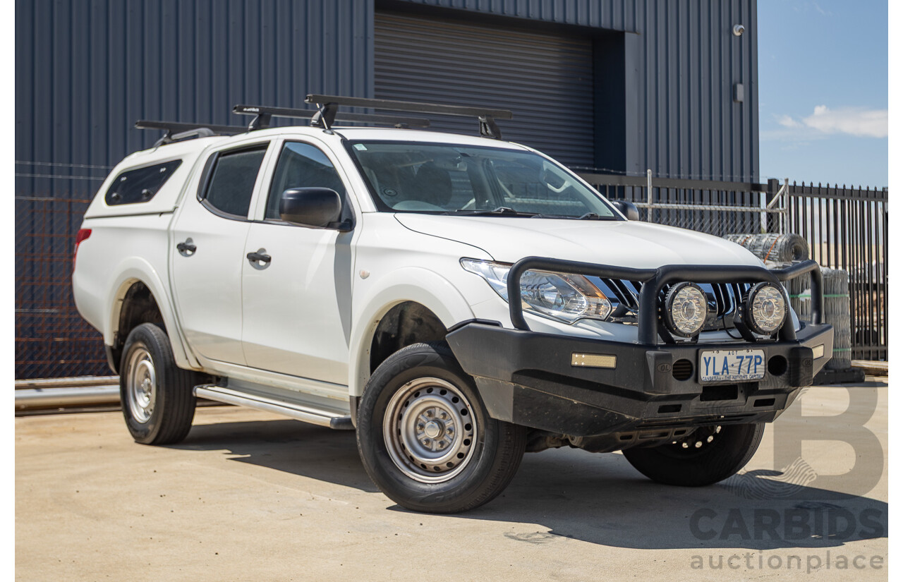 10/2016 Mitsubishi Triton GLX (4x4) MQ MY16 Dual Cab Utility Solid White Turbo Diesel 2.4L