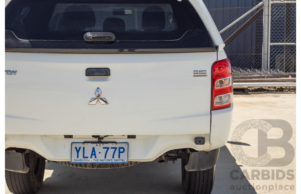 10/2016 Mitsubishi Triton GLX (4x4) MQ MY16 Dual Cab Utility Solid White Turbo Diesel 2.4L