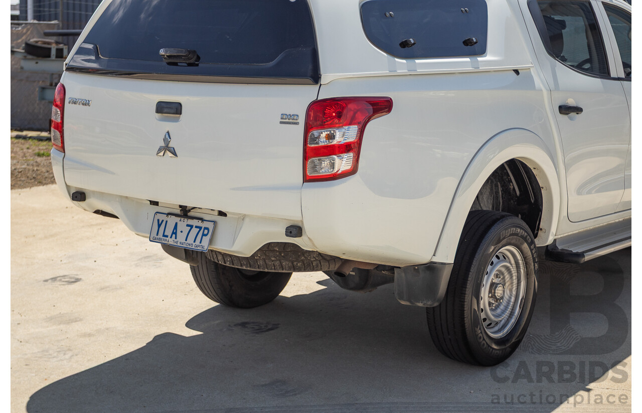 10/2016 Mitsubishi Triton GLX (4x4) MQ MY16 Dual Cab Utility Solid White Turbo Diesel 2.4L