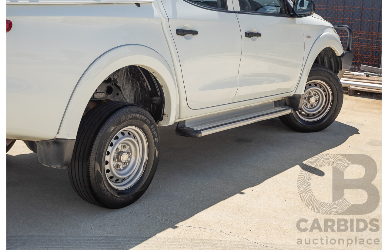 10/2016 Mitsubishi Triton GLX (4x4) MQ MY16 Dual Cab Utility Solid White Turbo Diesel 2.4L