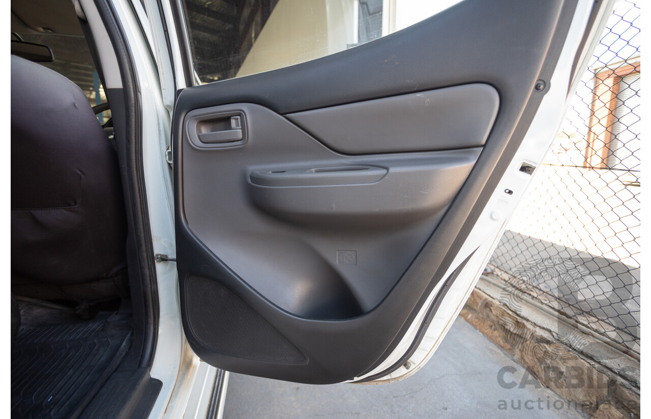 10/2016 Mitsubishi Triton GLX (4x4) MQ MY16 Dual Cab Utility Solid White Turbo Diesel 2.4L