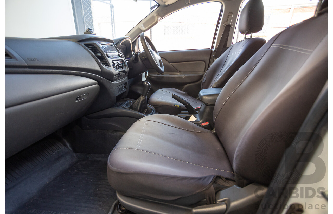 10/2016 Mitsubishi Triton GLX (4x4) MQ MY16 Dual Cab Utility Solid White Turbo Diesel 2.4L