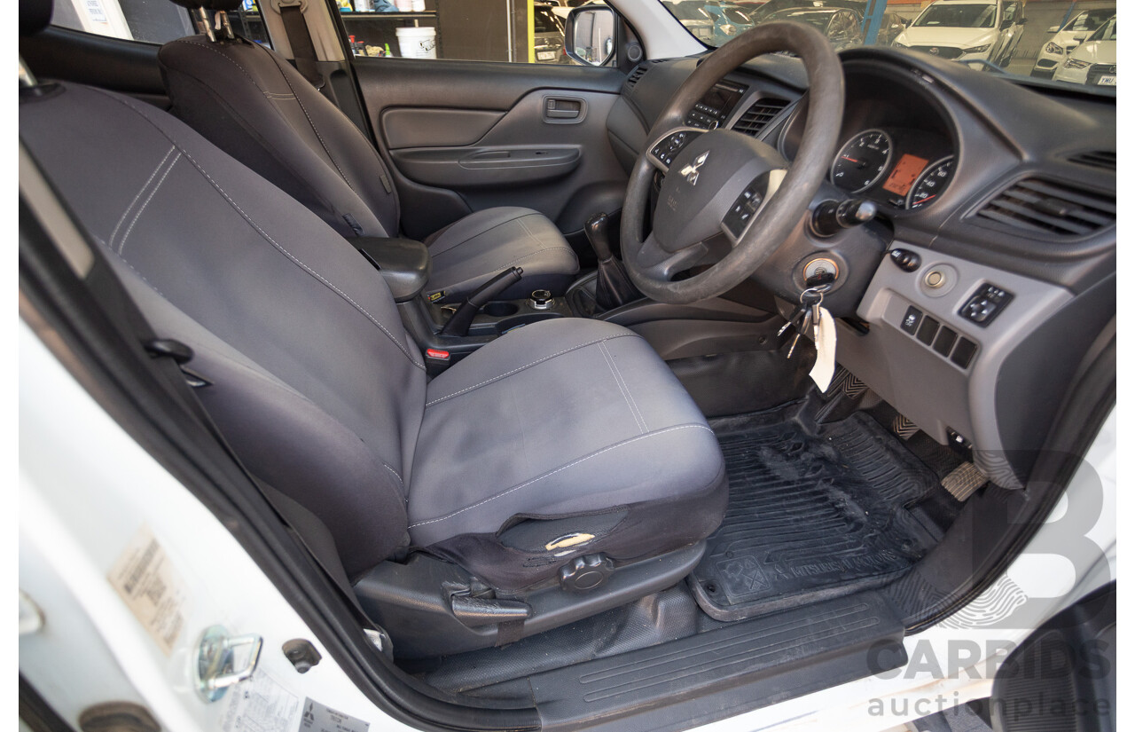 10/2016 Mitsubishi Triton GLX (4x4) MQ MY16 Dual Cab Utility Solid White Turbo Diesel 2.4L