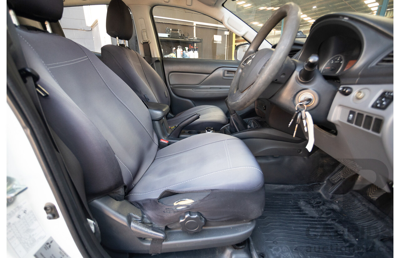 10/2016 Mitsubishi Triton GLX (4x4) MQ MY16 Dual Cab Utility Solid White Turbo Diesel 2.4L