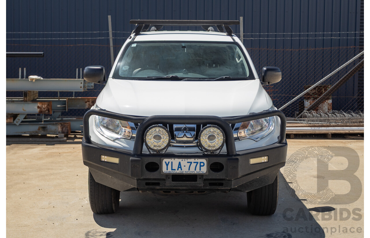 10/2016 Mitsubishi Triton GLX (4x4) MQ MY16 Dual Cab Utility Solid White Turbo Diesel 2.4L