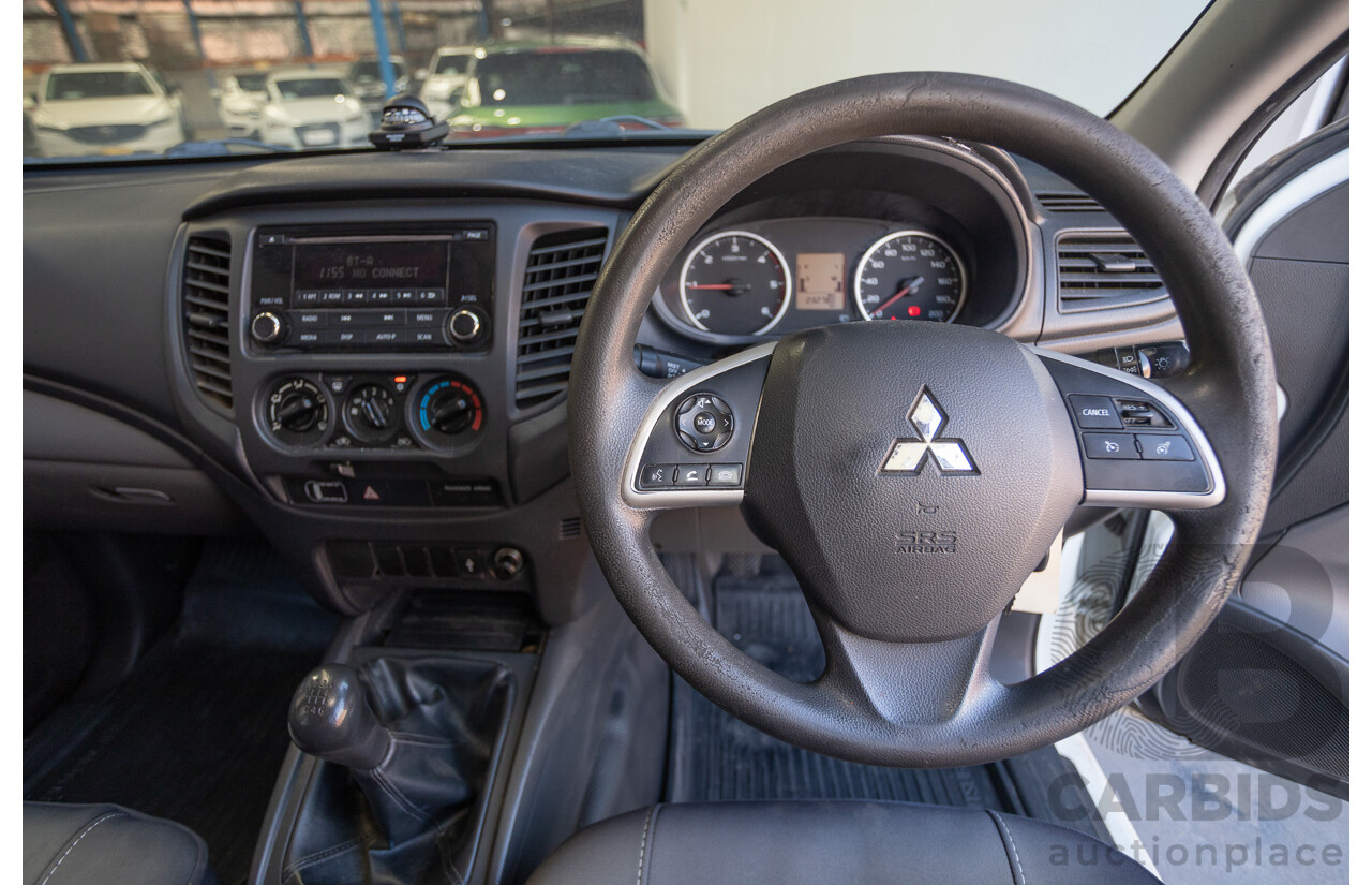 10/2016 Mitsubishi Triton GLX (4x4) MQ MY16 Dual Cab Utility Solid White Turbo Diesel 2.4L