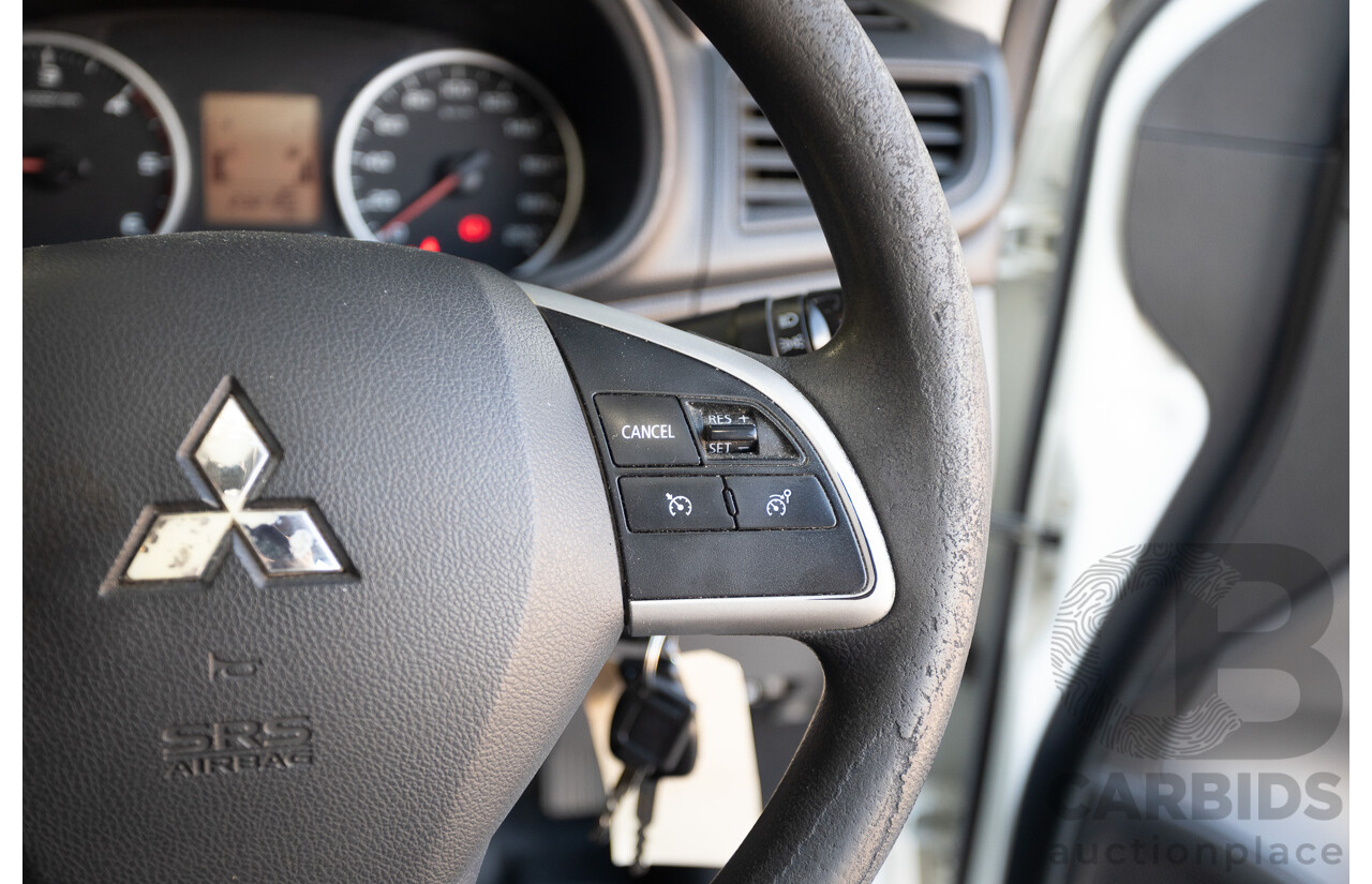 10/2016 Mitsubishi Triton GLX (4x4) MQ MY16 Dual Cab Utility Solid White Turbo Diesel 2.4L