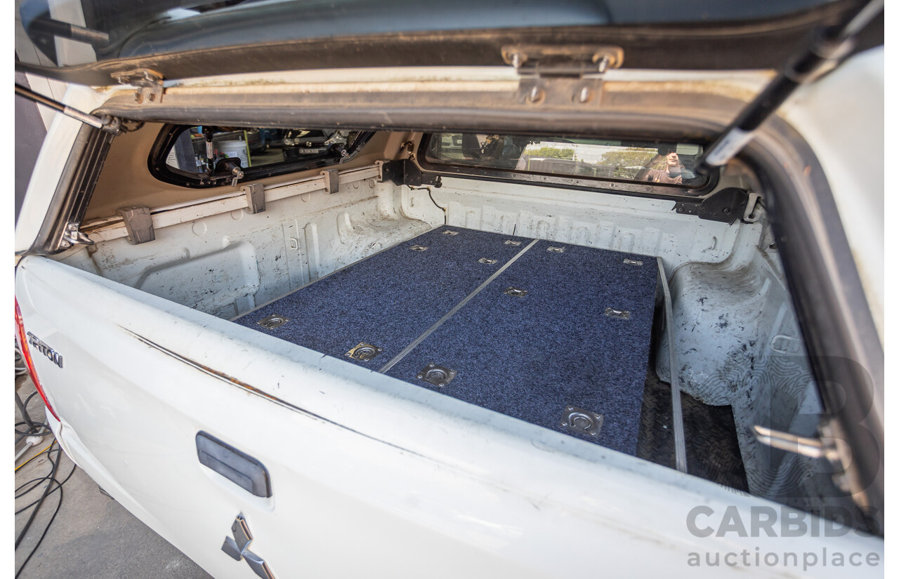 10/2016 Mitsubishi Triton GLX (4x4) MQ MY16 Dual Cab Utility Solid White Turbo Diesel 2.4L