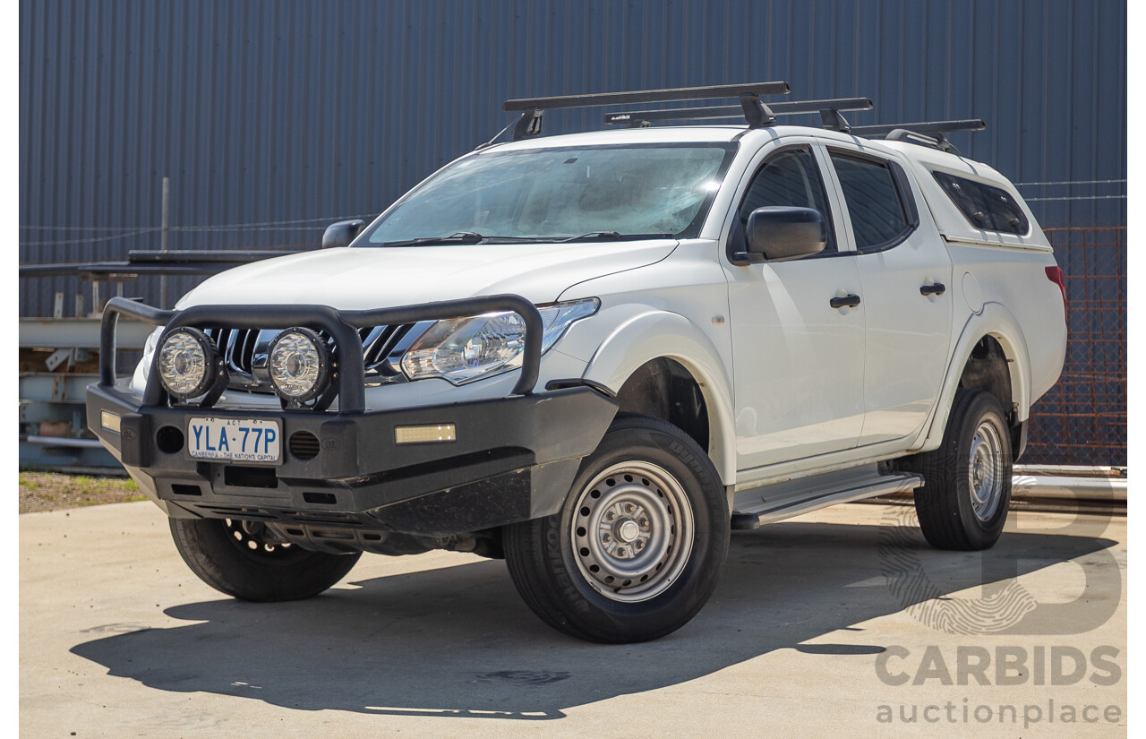 10/2016 Mitsubishi Triton GLX (4x4) MQ MY16 Dual Cab Utility Solid White Turbo Diesel 2.4L