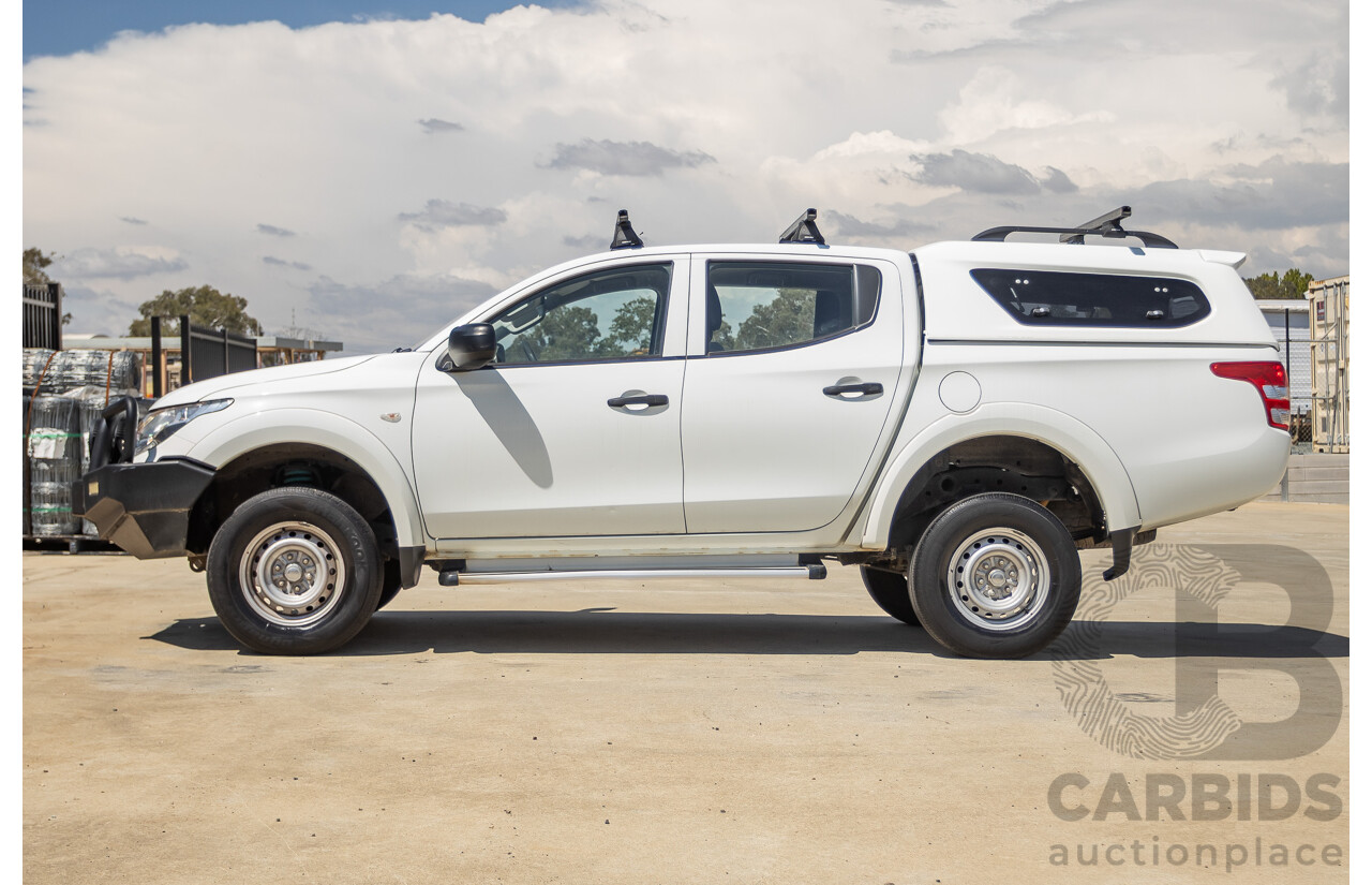 10/2016 Mitsubishi Triton GLX (4x4) MQ MY16 Dual Cab Utility Solid White Turbo Diesel 2.4L