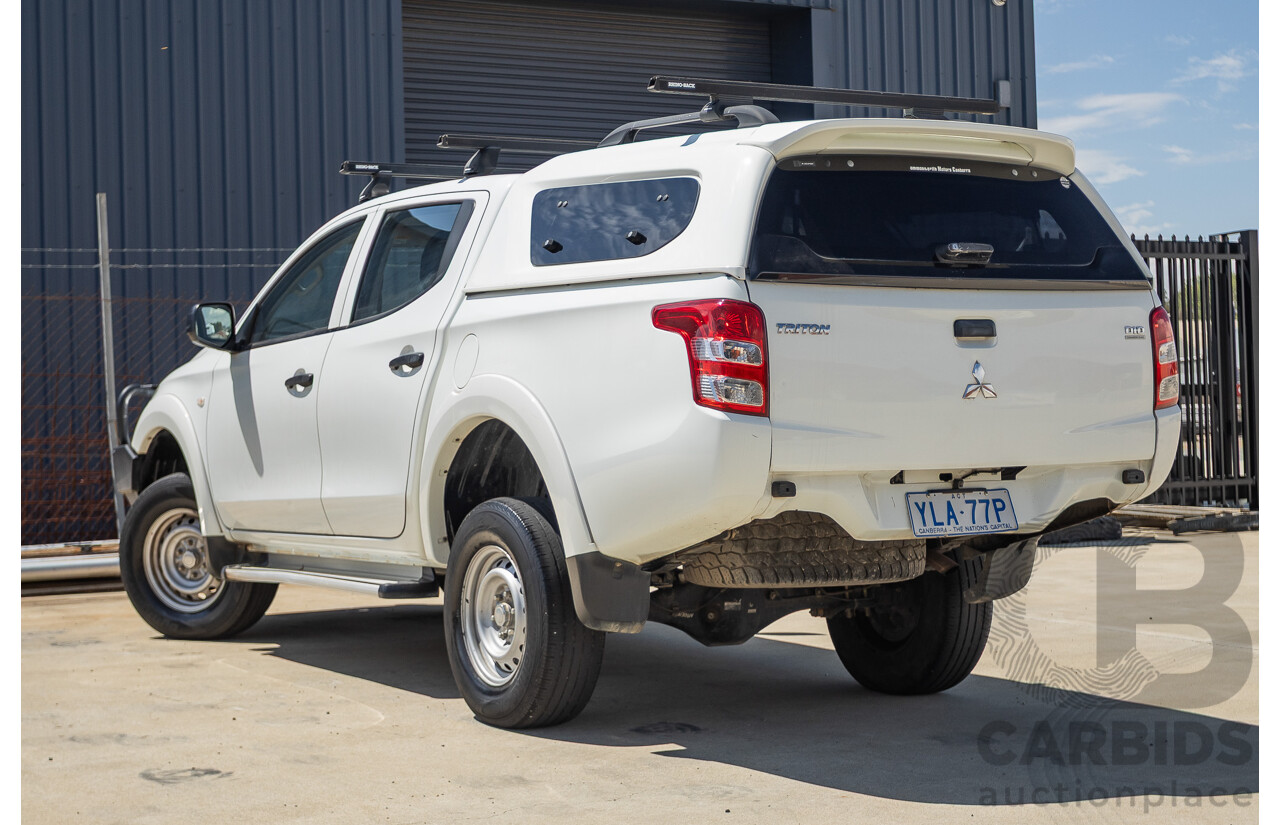10/2016 Mitsubishi Triton GLX (4x4) MQ MY16 Dual Cab Utility Solid White Turbo Diesel 2.4L