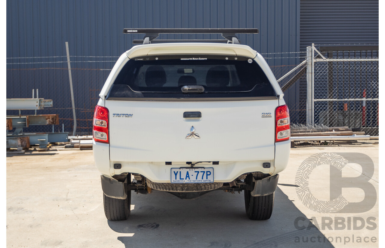 10/2016 Mitsubishi Triton GLX (4x4) MQ MY16 Dual Cab Utility Solid White Turbo Diesel 2.4L