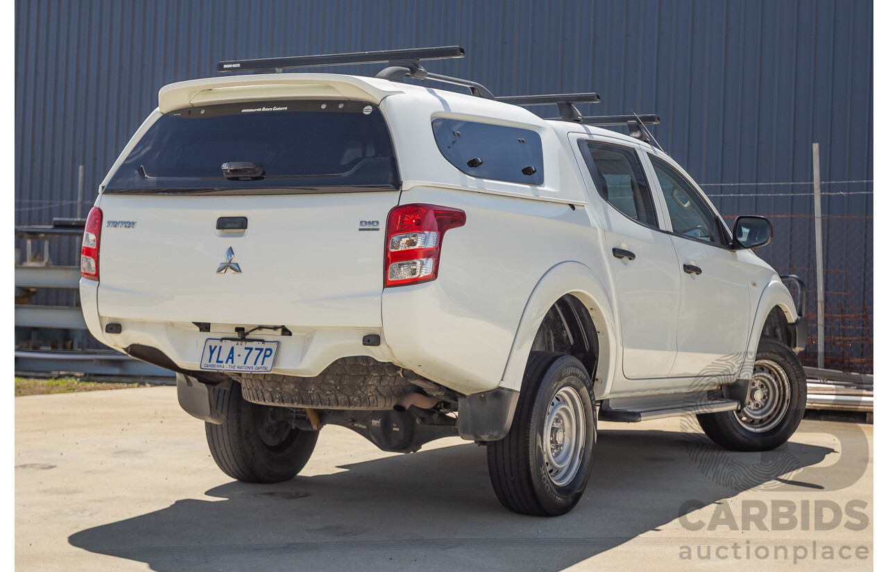 10/2016 Mitsubishi Triton GLX (4x4) MQ MY16 Dual Cab Utility Solid White Turbo Diesel 2.4L