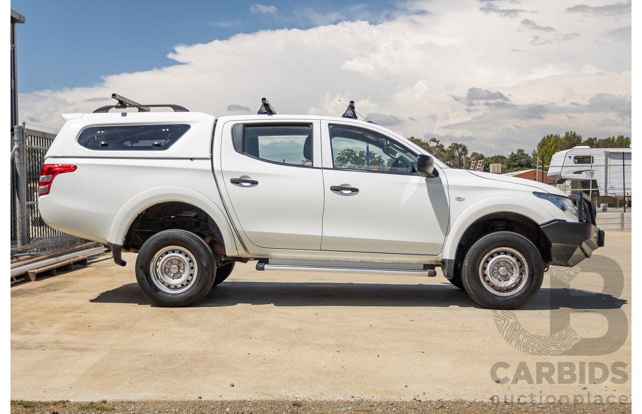 10/2016 Mitsubishi Triton GLX (4x4) MQ MY16 Dual Cab Utility Solid White Turbo Diesel 2.4L