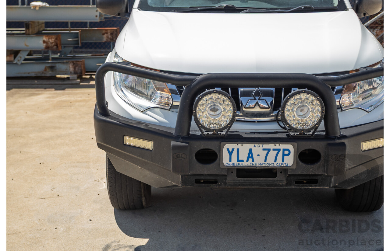 10/2016 Mitsubishi Triton GLX (4x4) MQ MY16 Dual Cab Utility Solid White Turbo Diesel 2.4L