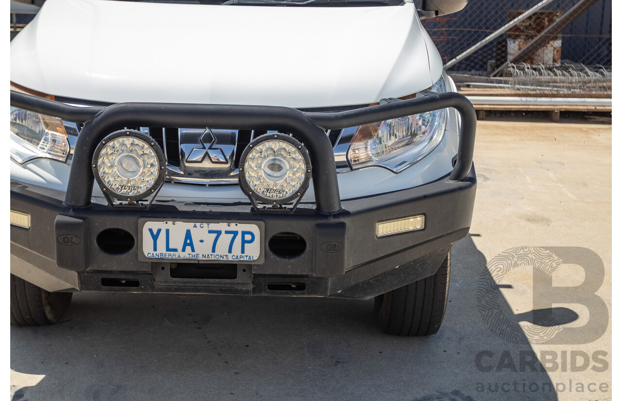 10/2016 Mitsubishi Triton GLX (4x4) MQ MY16 Dual Cab Utility Solid White Turbo Diesel 2.4L