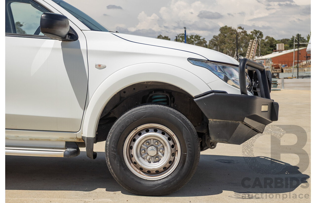 10/2016 Mitsubishi Triton GLX (4x4) MQ MY16 Dual Cab Utility Solid White Turbo Diesel 2.4L