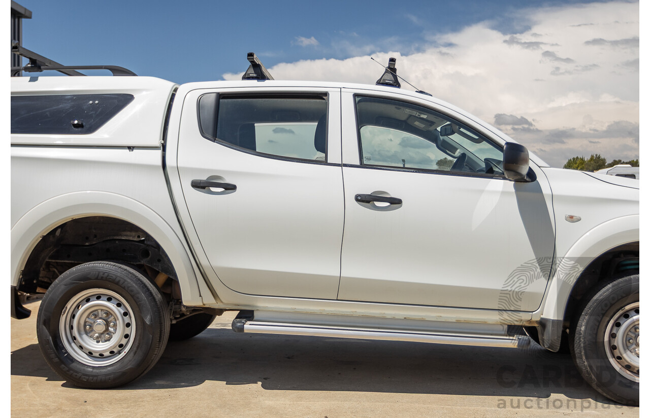 10/2016 Mitsubishi Triton GLX (4x4) MQ MY16 Dual Cab Utility Solid White Turbo Diesel 2.4L