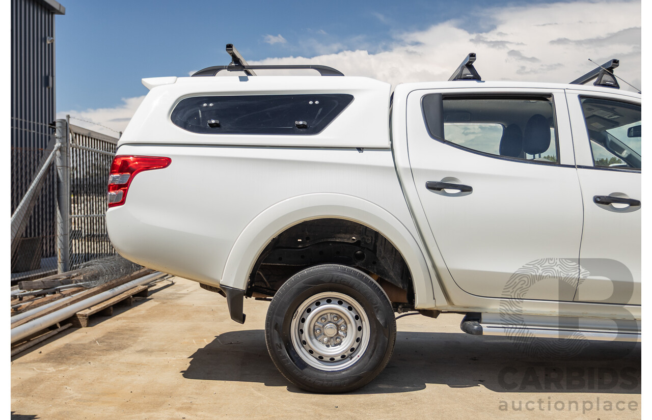 10/2016 Mitsubishi Triton GLX (4x4) MQ MY16 Dual Cab Utility Solid White Turbo Diesel 2.4L
