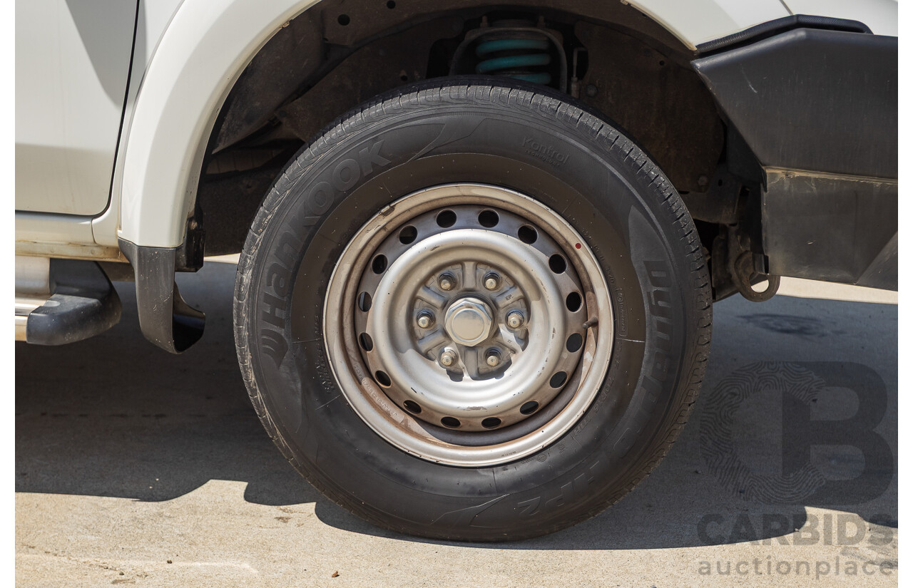 10/2016 Mitsubishi Triton GLX (4x4) MQ MY16 Dual Cab Utility Solid White Turbo Diesel 2.4L