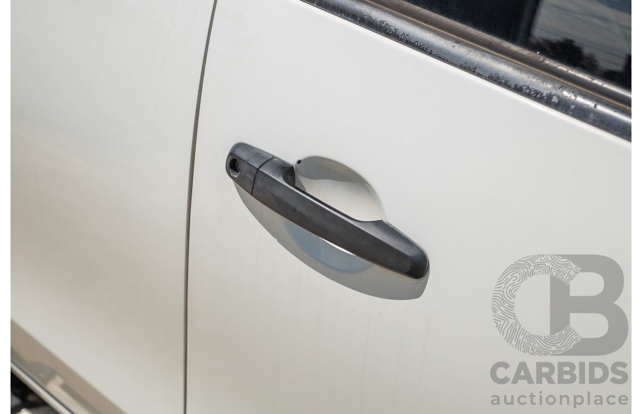 10/2016 Mitsubishi Triton GLX (4x4) MQ MY16 Dual Cab Utility Solid White Turbo Diesel 2.4L