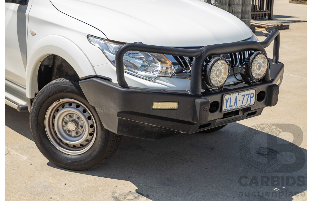 10/2016 Mitsubishi Triton GLX (4x4) MQ MY16 Dual Cab Utility Solid White Turbo Diesel 2.4L